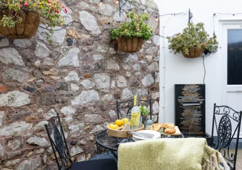 The enclosed courtyard garden & alfresco dining area at Lilly's Cottage, Dawlish
