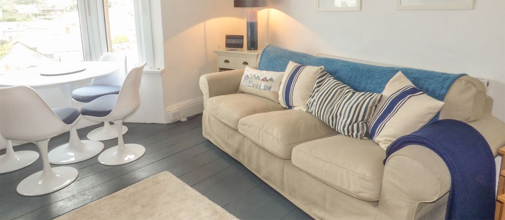 Limpet Cottage, Brixham is a traditional townhouse with harbour views for watching boats come and go. Spread over three floors it is comfortably furnished with two bedrooms, fully-equipped kitchen & private garden for BBQs. Shops, restaurants & beach nearby.
