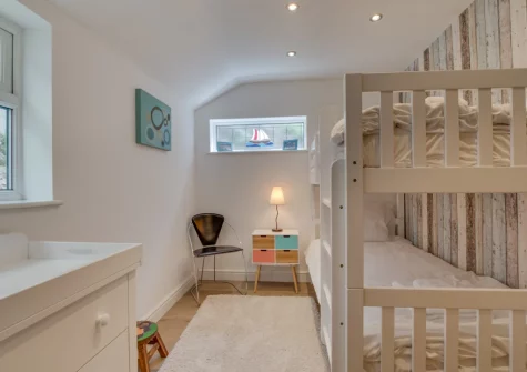A ground-floor bunk bedroom suitable for two children can also be booked