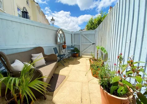 The courtyard patio & outdoor sitting area at Lisburne Place, Torquay