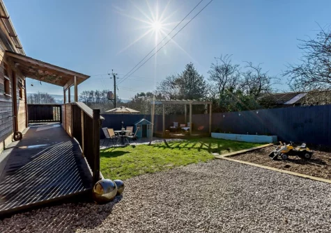 The enclosed garden & patio at Little Ash Lodge, Fenny Bridges