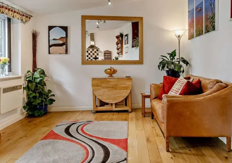 Little Beau, Ottery St Mary is a charming one-bedroom barn conversion steeped in Devon history. Relax in cosy country interiors, enjoy a private courtyard, and explore the stunning Jurassic Coast. Perfect for a relaxing romantic getaway.