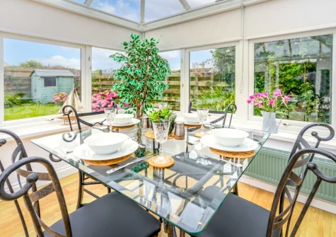 The conservatory dining area at Little Birds, St Merryn