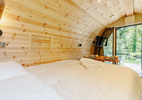 The king-size bed at Little Cedar at Meldon Lodge Park, Meldon