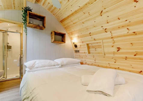 The king-size bed at Little Cedar at Meldon Lodge Park, Meldon