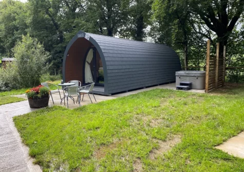 The patio, alfresco dining area & hot tub at Little Cedar at Meldon Lodge Park, Meldon