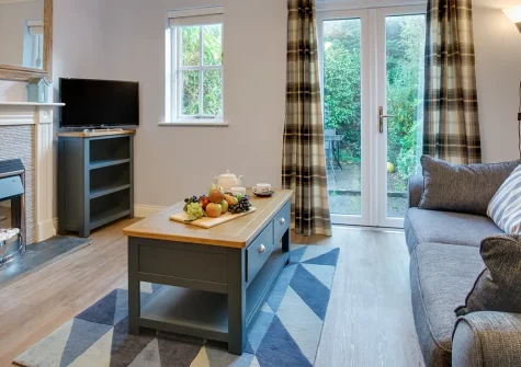 Little Dolphins, Padstow is a charming 2-bedroom cottage with contemporary comfort and enclosed patio garden. Perfectly positioned near the famous harbour, beautiful beaches, and scenic coastal walks for unforgettable Cornish family escapes.