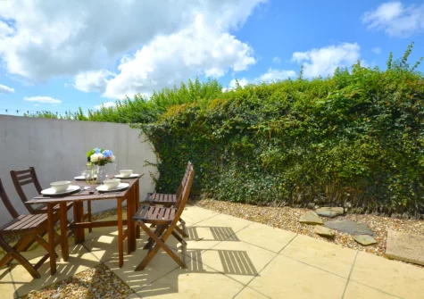 The enclosed terrace & alfresco dining area at Little Egret, Padstow