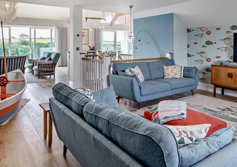 Little Egret View, Newquay is an exceptional eight-bedroom family home overlooking the Gannel Estuary, minutes from Fistral Beach. Featuring indoor entertainment, balconies, and a games room, it's perfect for creating treasured family memories.