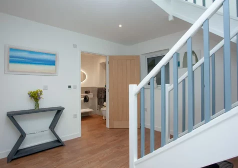 The entrance hallway & stairs up to the first floor at Little Foxes, Perranporth