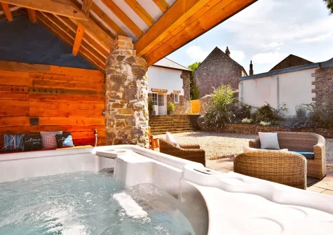 The hot tub & outdoor sitting area at Little Marland Barn, Petrockstowe