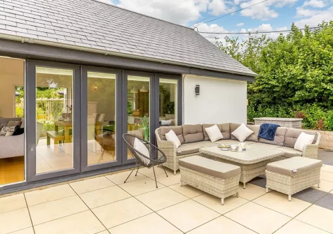 The patio & outdoor sitting area at Little Owls Barn, Tideford Cross