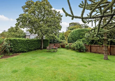 The enclosed garden & outdoor sitting area at Little Pear Tree Barn, Kingston