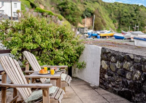 A perfect spot for morning coffee, watching the waves on the beach from the garden