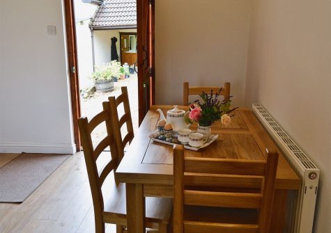 The dining area at Little Shelvin Farm Cottage, Luppitt