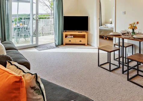 Little Trelana, Kilkhampton is a charming single-storey coastal cottage perfect for couples and families. Enjoy countryside views, sea vistas, contemporary comforts, and easy beach access. Create cherished seaside memories in this peaceful retreat.