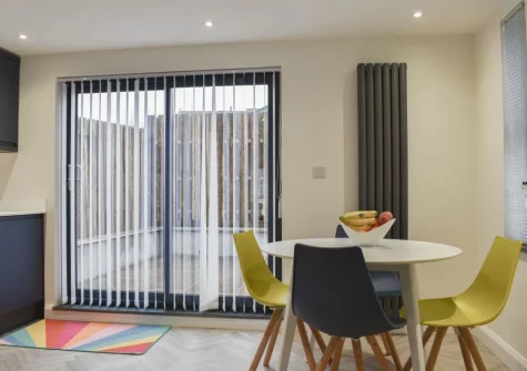 The dining area, which leads out to the enclosed patio garden & outdoor sitting area, at Little Trevose, Padstow