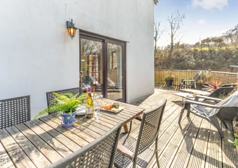 The decked patio & alfresco dining area at Little Wagtail, Chilla