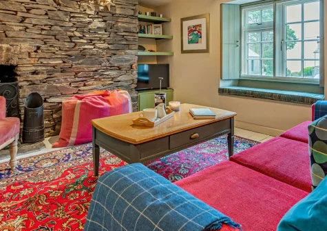 Lobster House, Padstow is a charming two-bedroom cottage brimming with Cornish character, featuring an open fire, estuary views, and a peaceful shared courtyard, all just a short stroll from the harbour and celebrated waterfront restaurants.