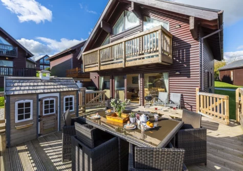 The decked patio & alfresco dining area at Lodge 40, Retallack Resort & Spa, Winnard's Perch
