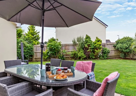 The patio, alfresco dining area & garden at Long Beach, Westward Ho!