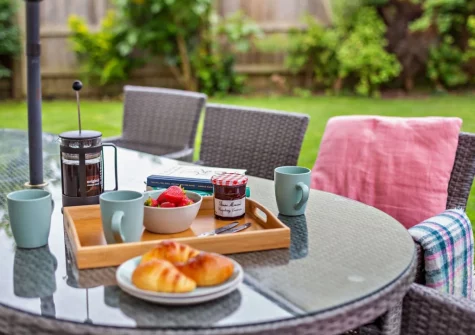 The patio & alfresco dining area at Long Beach, Westward Ho!