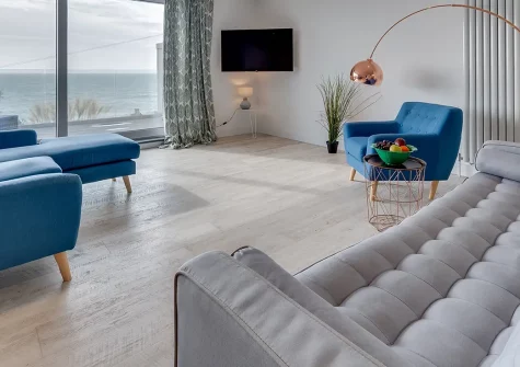 Longitude 5° W, Porthleven is a stunning architect-designed coastal retreat with breathtaking sea views and contemporary luxury. Enjoy direct beach access, charming harbour walks, and sophisticated modern living in this hillside sanctuary.