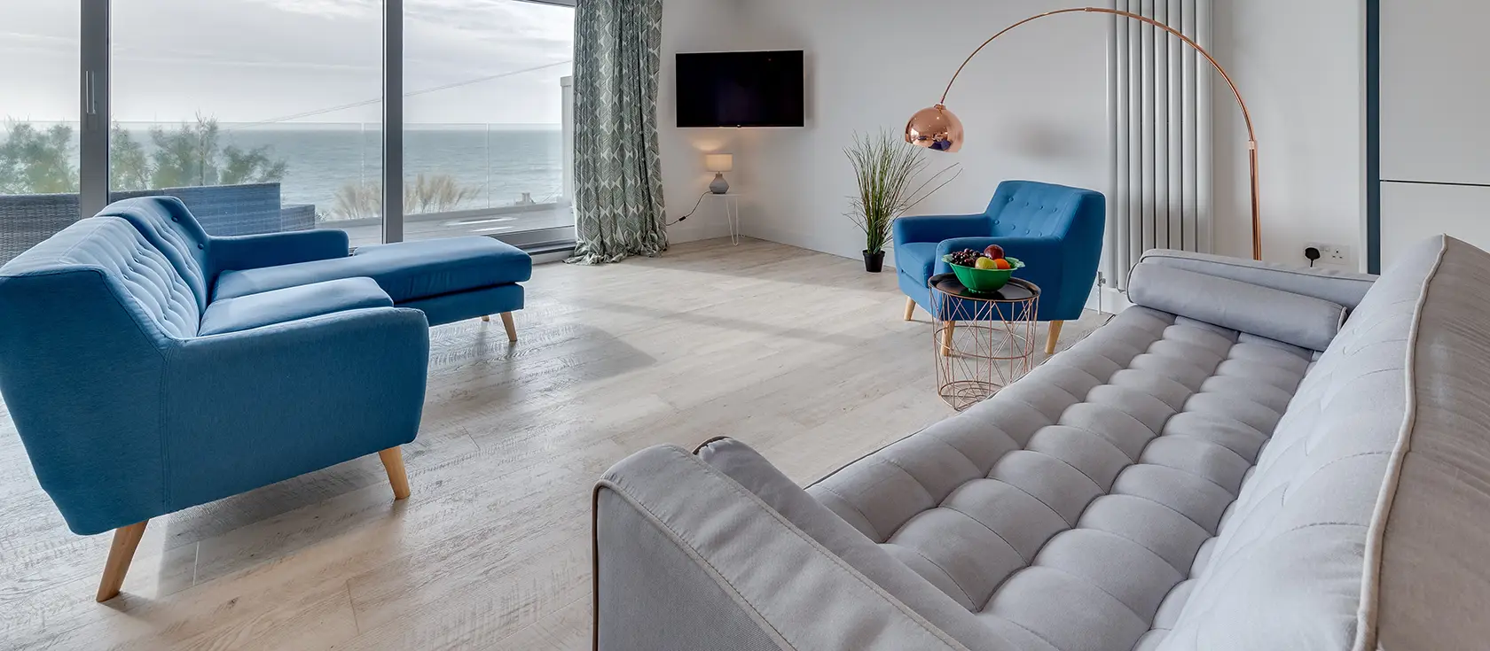 Longitude 5° W, Porthleven is a stunning architect-designed coastal retreat with breathtaking sea views and contemporary luxury. Enjoy direct beach access, charming harbour walks, and sophisticated modern living in this hillside sanctuary.