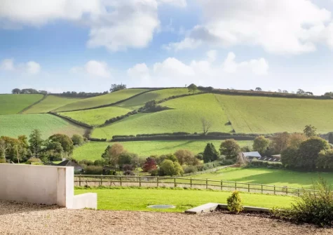 The countryside view from the patio, barbecue & alfresco dining area at Longpark Linhay, Compton
