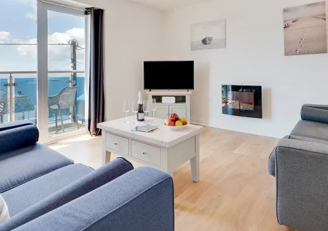 Loveday, Porthleven is a stylish seaside apartment with panoramic sea views, a furnished balcony, and flexible sleeping arrangements. Enjoy direct beach access and explore nearby attractions, perfect for families or couples seeking a coastal escape.