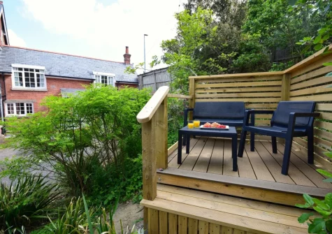 The private decked patio & alfreasco dining area at Loventor Cottage, Instow