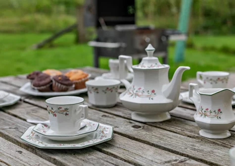 The patio, barbecue, alfresco dining area & enclosed gaden at Loveny Cottage, Two Waters Foot