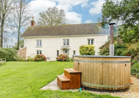 The garden &  Swedish wood fired hot tub at Lower Cannington Cottage, Witheridge