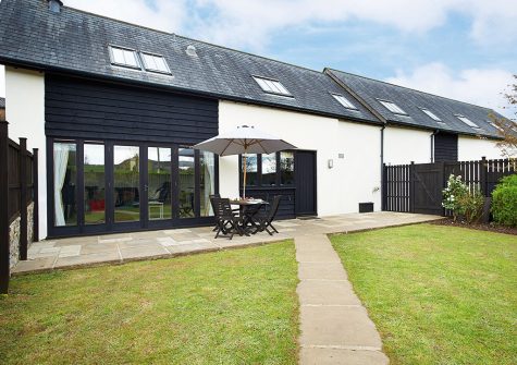 The patio & garden at Hunters Moon, Lower Curscombe Barn, Feniton