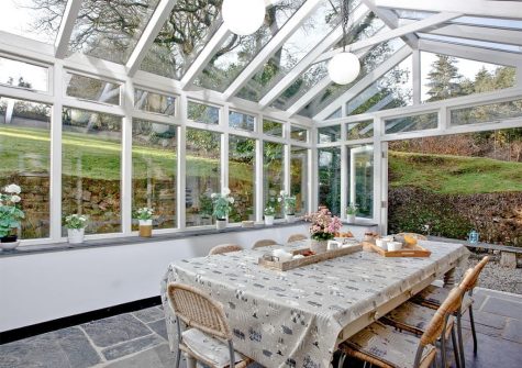The conservatory dining area at Lower Margate, Fletchersbridge