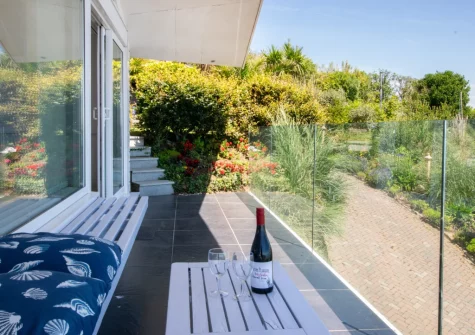 The south-facing, wrap-around balcony at Lower Trenarthan, Penzance