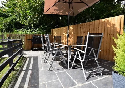The patio & alfresco dining area at patio & alfresco dining area at Lower Yeoland Barn, Swimbridge