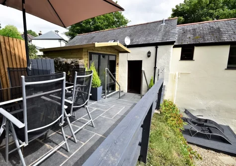 The patio & alfresco dining area at patio & alfresco dining area at Lower Yeoland Barn, Swimbridge