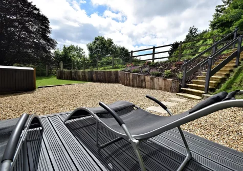 The decked patio & outdoor sitting area at Lower Yeoland Barn, Swimbridge