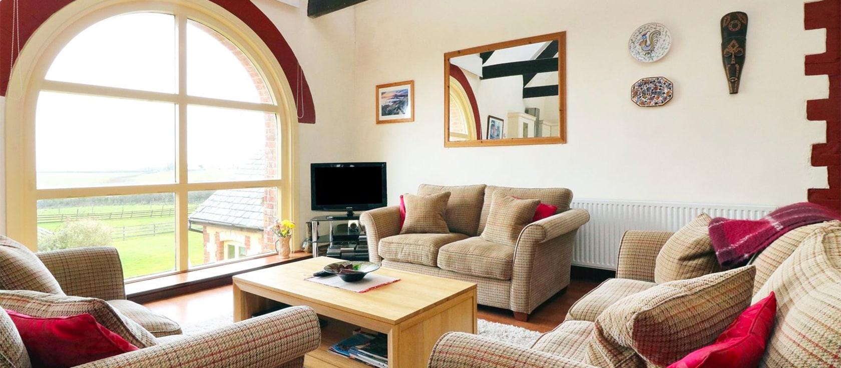 Lundy View The Granary is a beautifully converted Grade II listed barn conversion near Clovelly. The open plan living area has gorgeous rural / some sea views & there's a mezzanine for quiet reading. It boasts three bedrooms, two bathrooms, parking and a lawned garden.