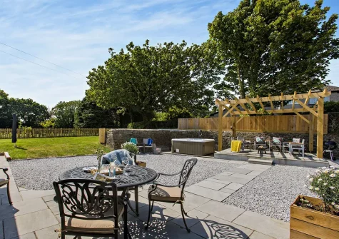 The patio & outdoor sitting area at Lutsford Farm Barn, Bursdon