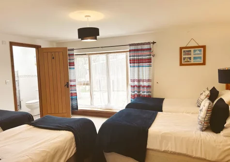 Bedroom #5 & en-suite shower room at Lympscott Barn, Bradworthy