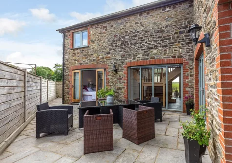 The patio & outdoor sitting area at Lympscott Barn, Bradworthy