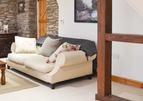 Lynton Cottage, Combe Martin is a spacious four-bedroom retreat in a charming seaside village, featuring a lovely garden with pergola, contemporary interiors, and easy access to award-winning sandy beaches and North Devon's spectacular coastline.