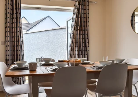 The dining area at Magnolia Cottage, Appledore
