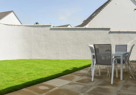 The patio, barbecue, alfresco dining area & enclosed garden at Magnolia Cottage, Appledore
