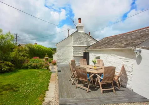 The decked patio, alfresco dining area & garden at Magpie Cottage, St Teath