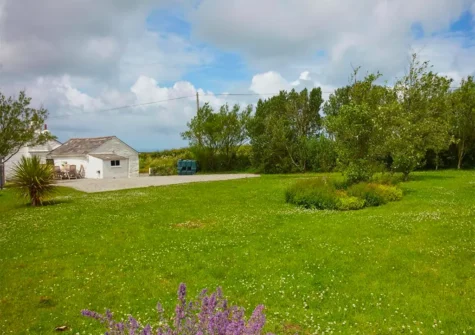 The large garden at Magpie Cottage, St Teath is perfect for activities with friends and family