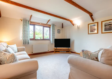 The living area at Mallard Cottage, Tregolds