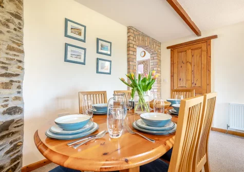The dining area at Mallard Cottage, Tregolds